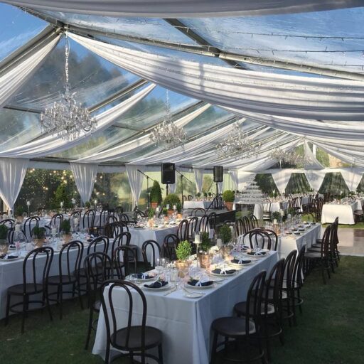 wedding-in-collinswood-with-10m-x-27m-clear-pavilion-with-roof-draping-and-bentwood-chairs