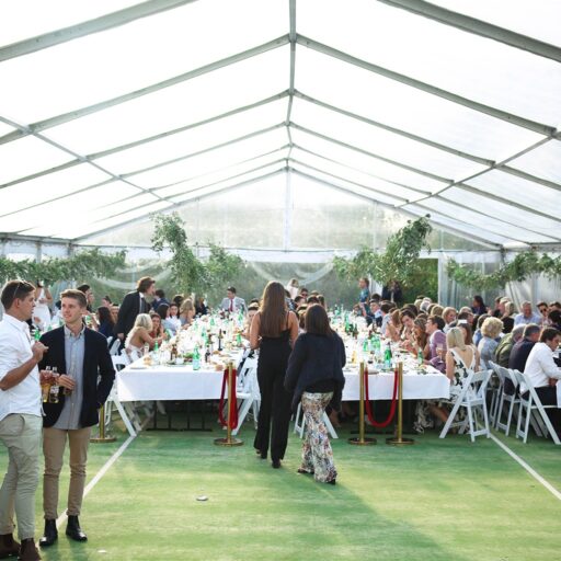 10m-x-21m-clear-roof-pavilion-with-long-tables-and-americana-chairs-for-a-private-birthday