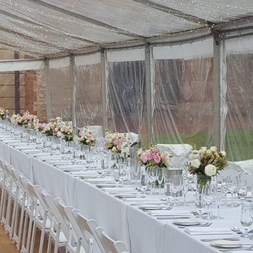Wedding-Armoury-Lawns-10m-x-24m-Clear-Pavilion-with-Americana-Chairs-Trestle-Tables-with-White-Linen-and-Roof-Lighting